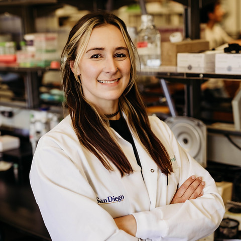 Nicola Osgood, smiling in a lab coat