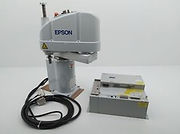 Epson SCARA-family illustration from the source review; Epson G6-451 dimensions and order scope are assessed in the text