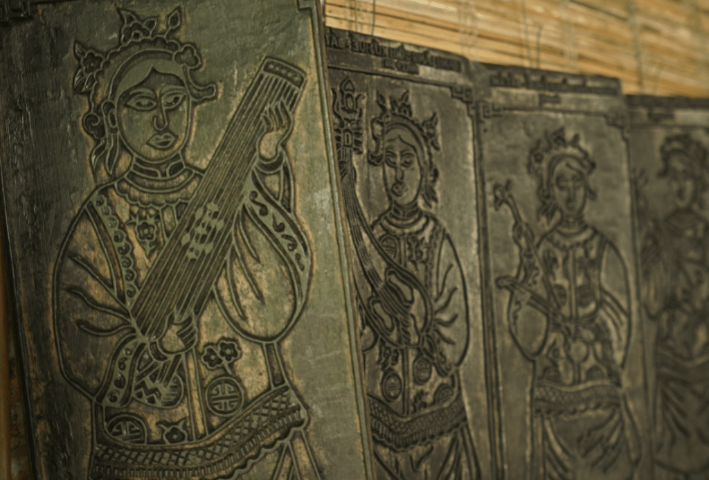 Sinh wood painting village