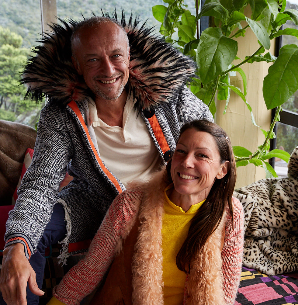 Giulio Cavallo and Simone Fougère dressed in funky clothes smiling at camera, Soul Thing retreat Aotea/Great Barrier Island
