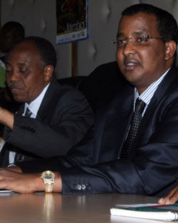 Mr Joseph Kinyua (left), PS Ministry of Finance and IEBC Chairman Ahmed Issack Hassan during the official signing of a project document for support to electoral reforms and processes in Kenya at Treasury building, Nairobi, Friday. Photo: Jonah Onyango/Standard