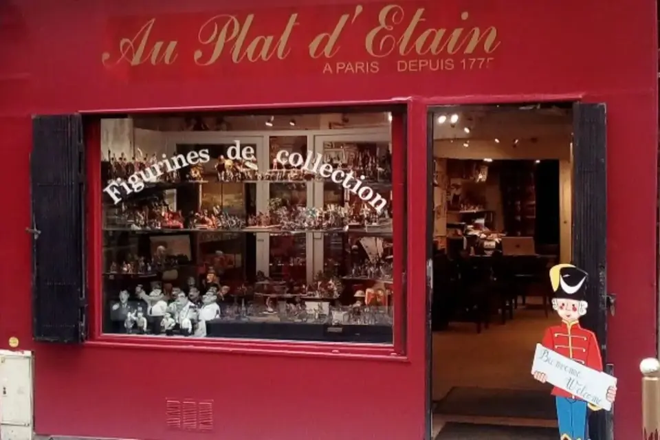the red facade of the oldest toy soldiers shop in Paris - Au Plat d' Etain