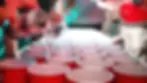 Beer being poored in Red Cups