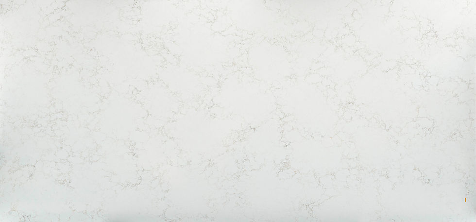 Vicostone Aspen™ quartz with soft gray and gold marble-like veining.