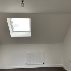 A completed room with an awkward wall on our project in Western Avenue for Durkan Construction.