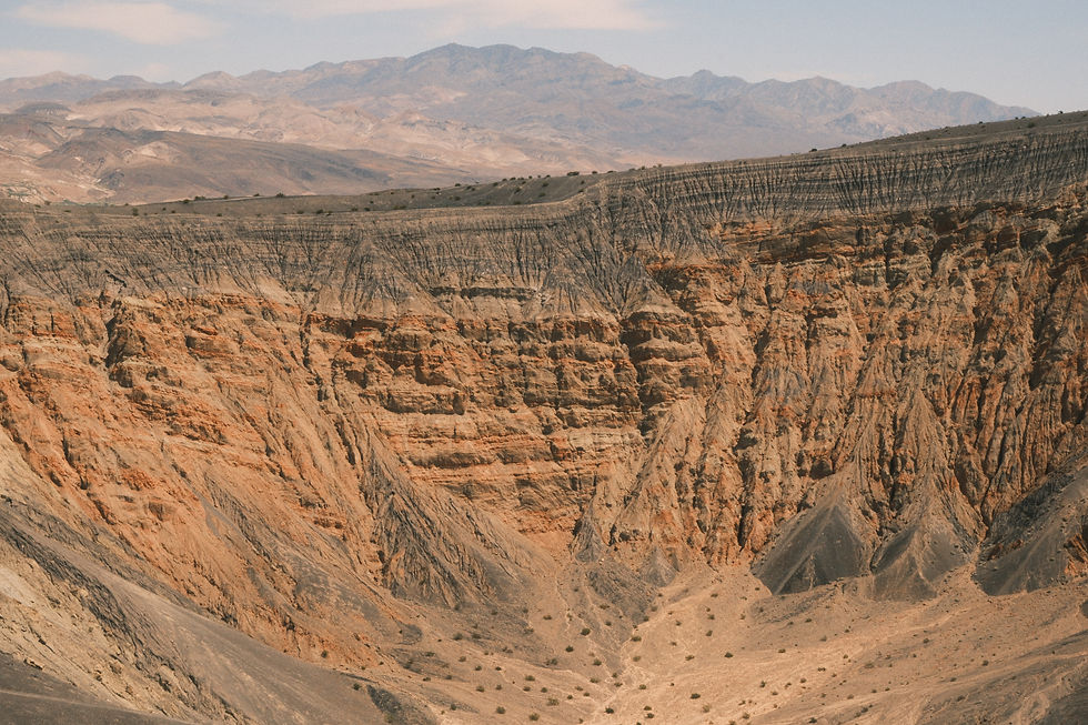 The Ubehebe Crater, that we drove past on the way to the Playa. It would be cool to walk the rim of it however, it was just too windy this day.