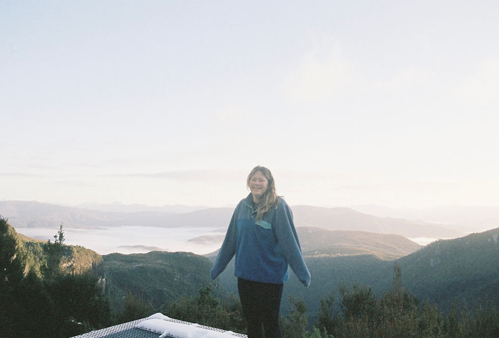 Me on the helipad, watching the fog roll through the valley below.