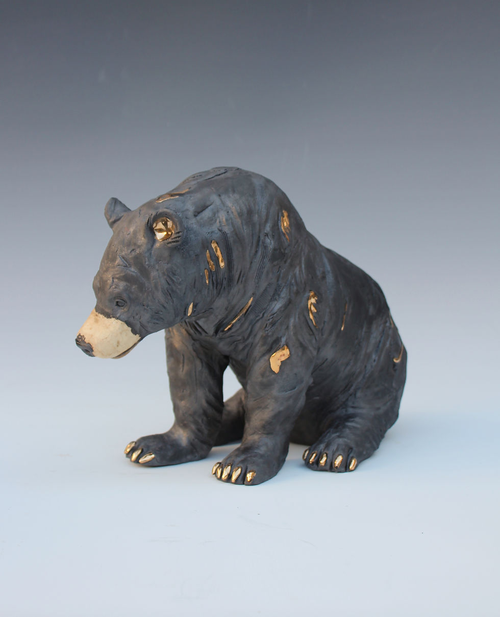 Crouching Black Bear