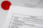 Apostille certificate document corner and red notary public stamp on official document see