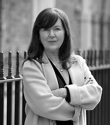 Black and white professional headshot of Madeleine Davitt