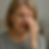 Senior woman rubbing her eye due to dimming vision, illustrating symptoms of vision loss or eye discomfort.