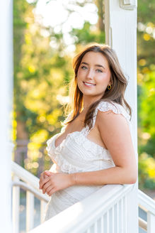 high school senior in white dress in gazebo Alexandria Virginia