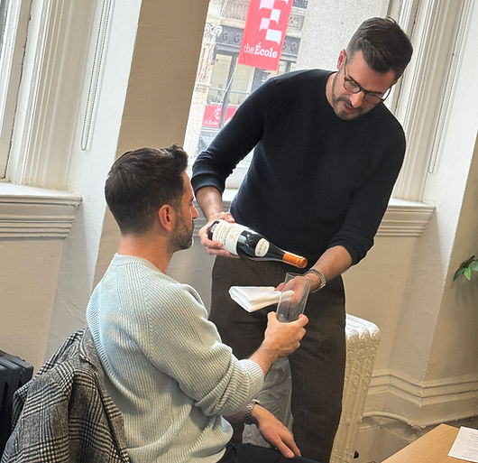 Robert Kane training new staff proper wine service