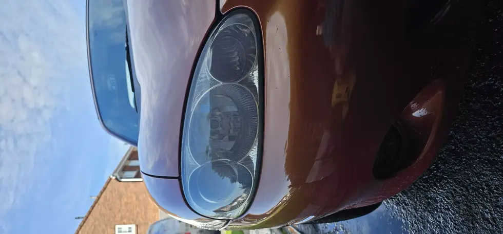 a close up of the headlight of a car
