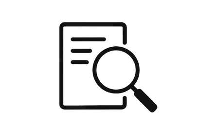 A magnifying glass over a written text document to represent a compliance gap analysis.
