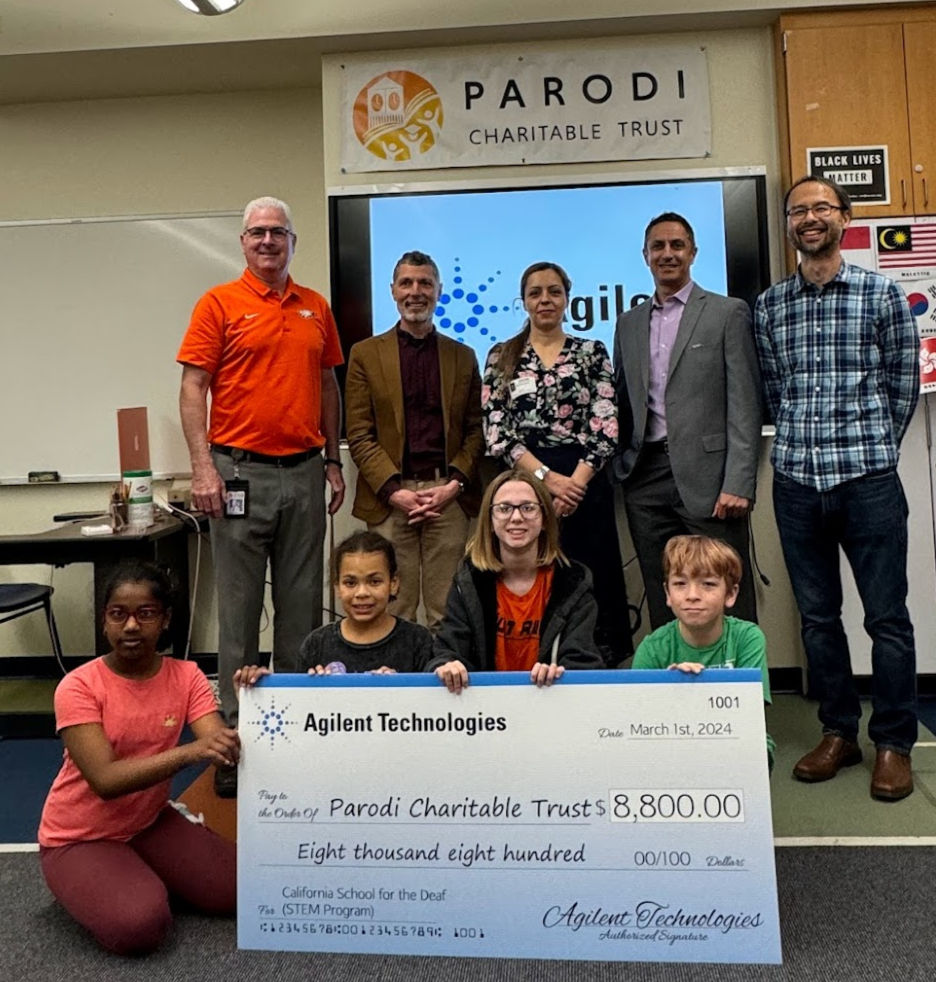 Representatives from CSD Elementary School, Parodi Charitable Trust, Agilent Technologies and a parent and students show appreciation for the support of the STEM Program.