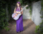 Naia in purple dress