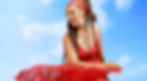 Naia in red dress