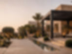 Modern villa courtyard with a pergola and pool