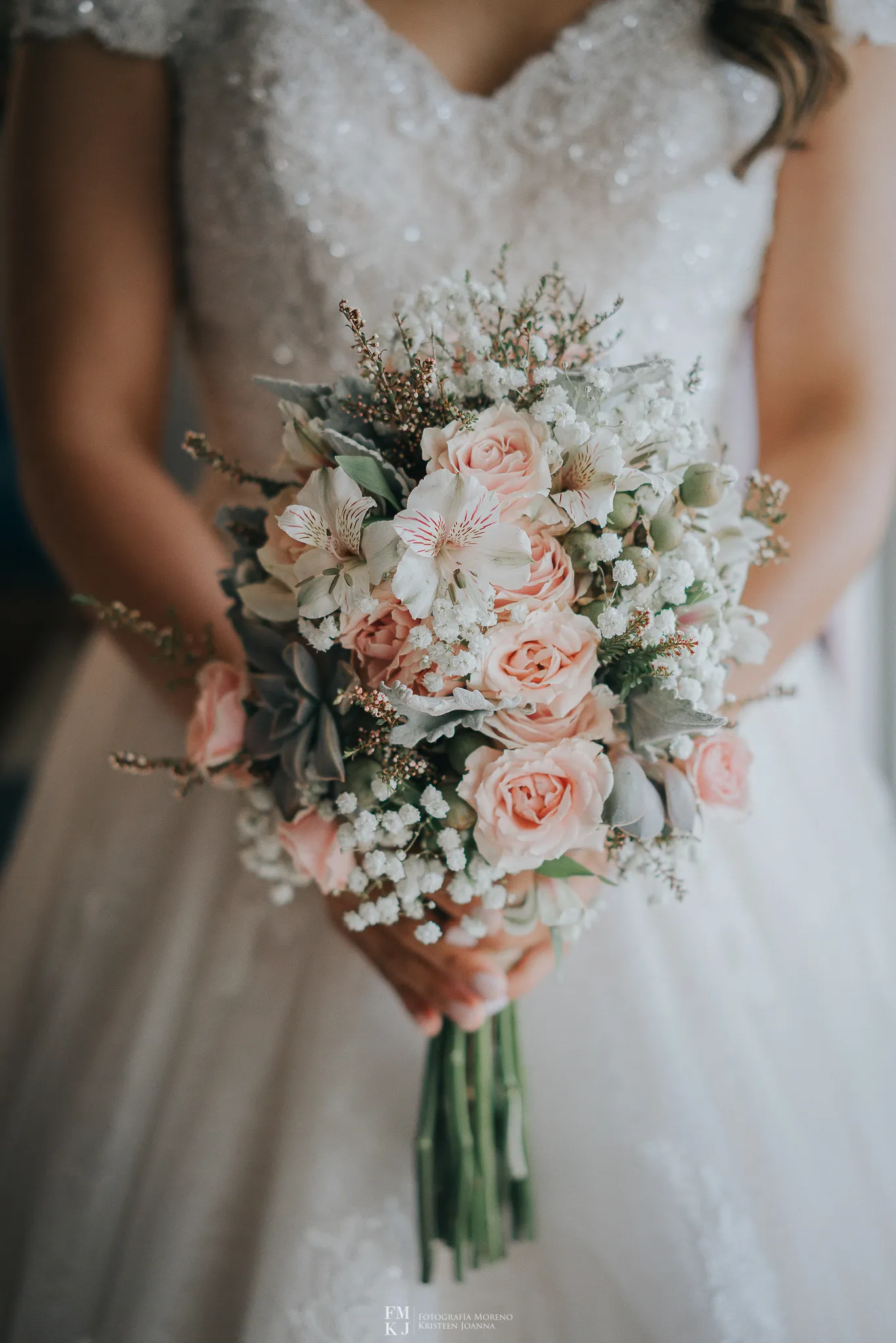 bride showing the bouquet