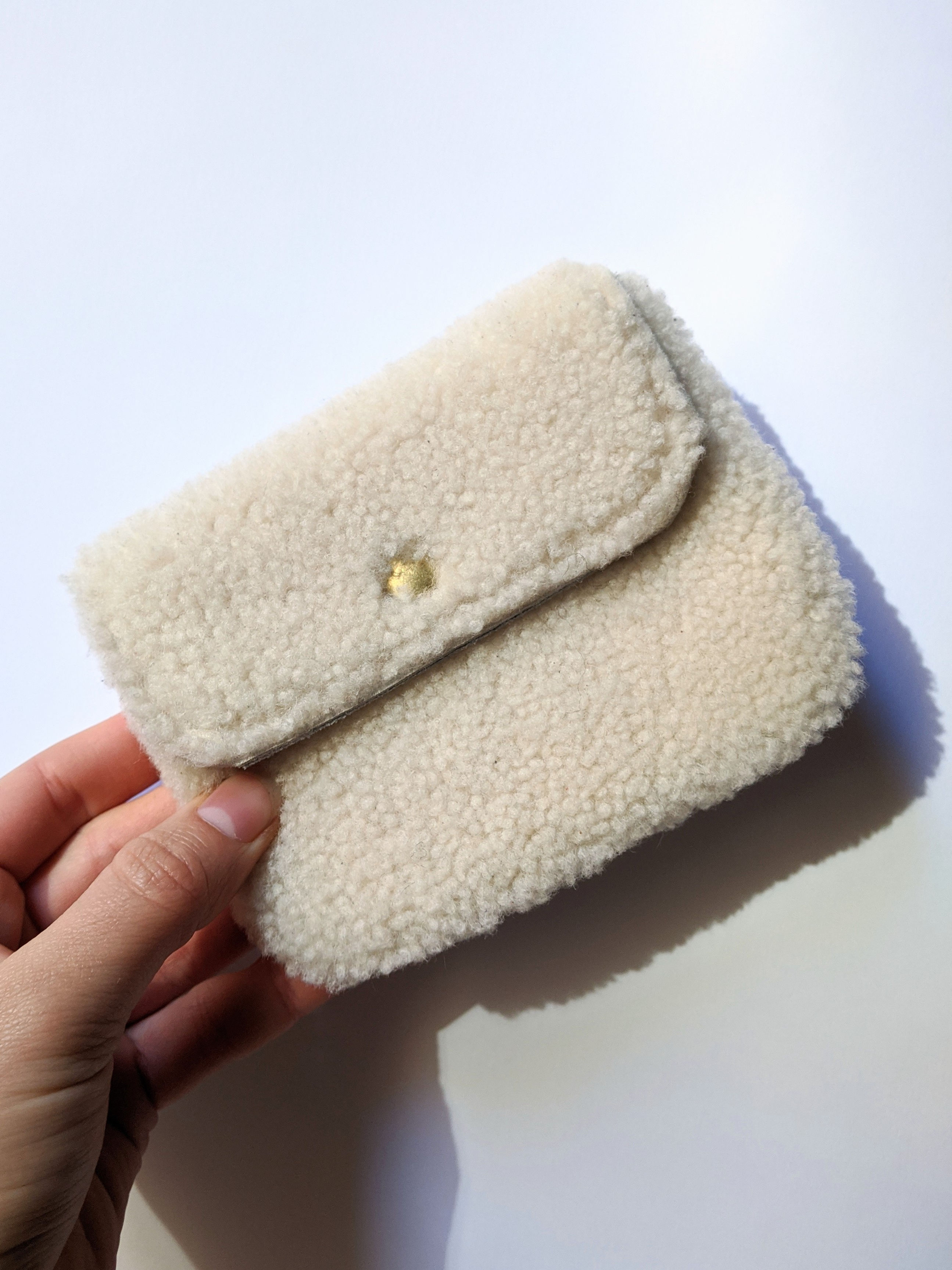 Grand porte-monnaie en peau lainée blanc