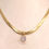 Thumbnail: Golden serpent necklace