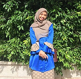 A woman in baju kurung