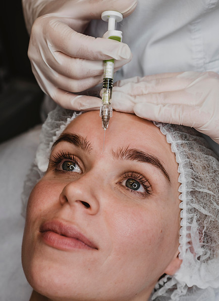 woman-getting-facial-beauty-injection-wellness-center.jpg