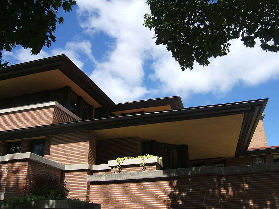 Low pitch roof with deep overhang