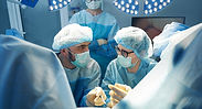 Surgeons performing penile surgery