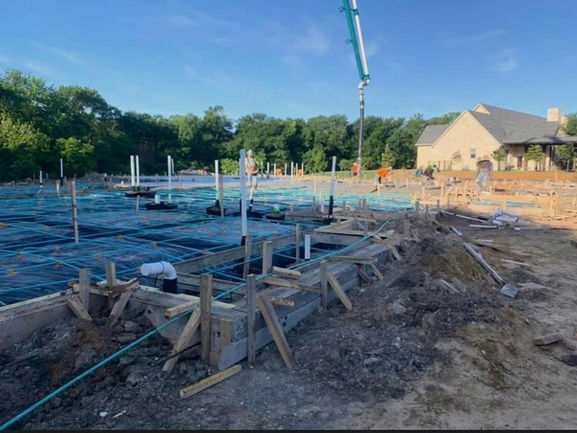 Preparation and forms for a post-tension residential foundation.
