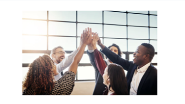 A team of people high fiving