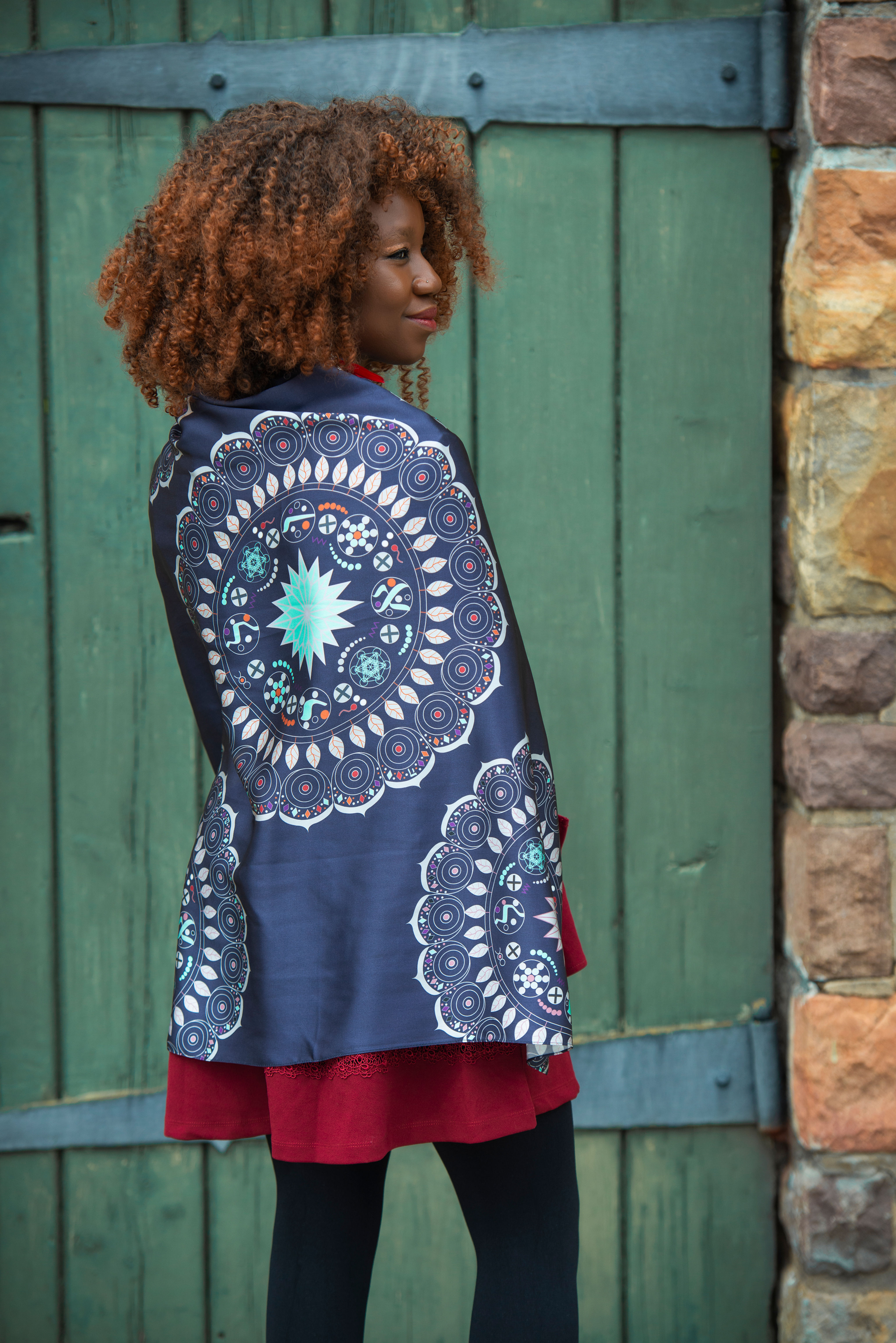 woman wearing luxury sapphire mandala silk scarf