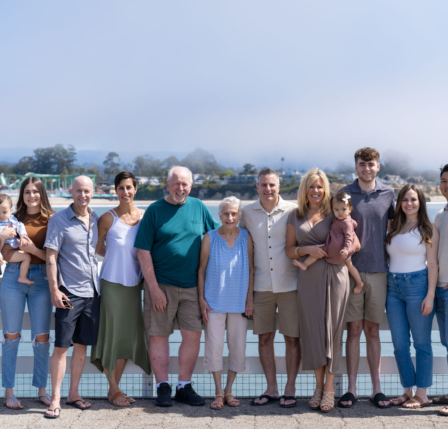 Large extended family group photo on the Santa Cruz Wharf