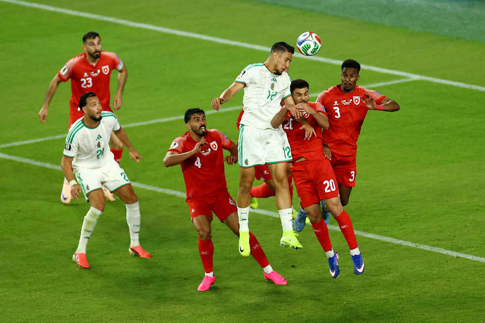 SOCCER: Algeria come from behind for 2-1 World Cup win over Jordan