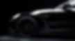 vecteezy_close-up-front-view-of-black-sports-car-with-copy-space_28151531.jpeg