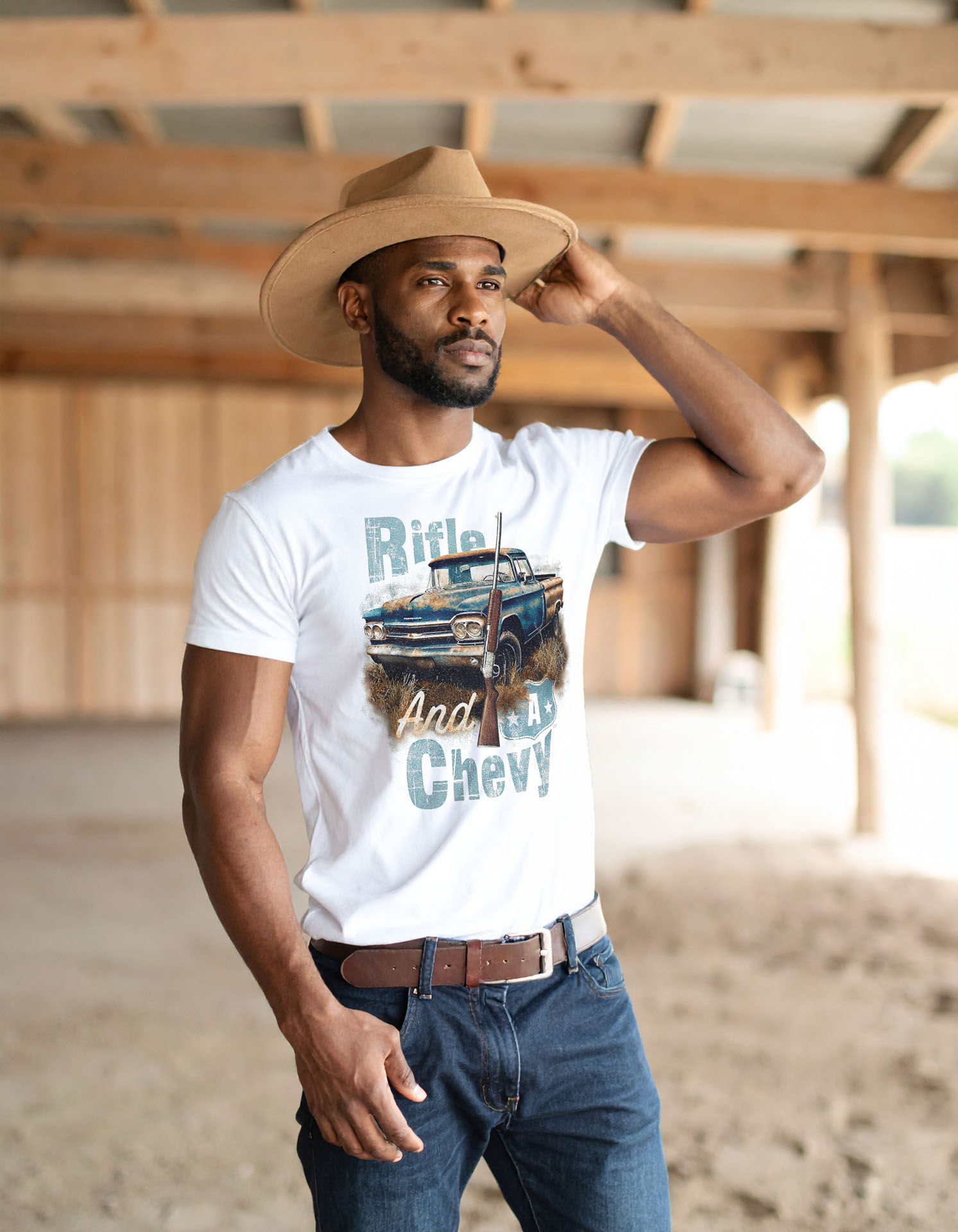 Rifle And A Chevy 2 Western Tee worn by melanated male model, showcasing bold western graphic design