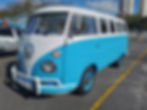 a blue restored VW Kombi bus that needs additionlal work