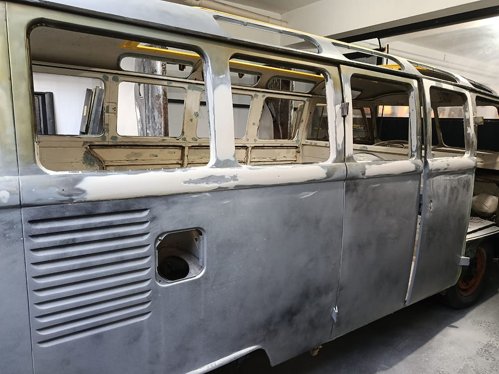 side panel sand and prep for paint on a VW 23 window project bus.