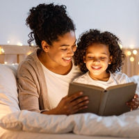 Mother reading with daughter