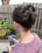 Checking phone in the garden
