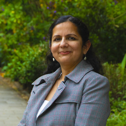 Portrait photograph of Manisha, a member of the team