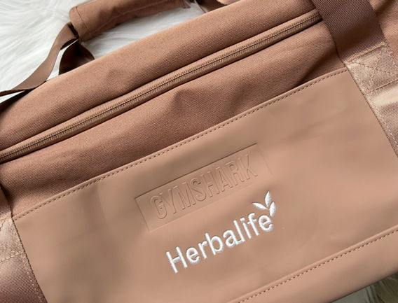 sac de sport personnalisé avec marque Herbalife brodé