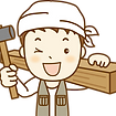 金づちを持っている大工