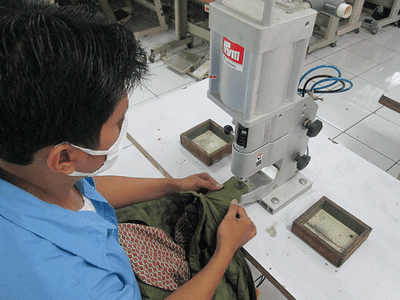 Snap Attaching Machine