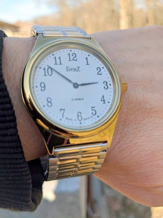 Thumbnail: Wrist showing a gold and silver watch with 
