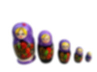 Purple Matryoshka dolls sit in a row, with floral details, on a white surface.