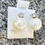 Thumbnail: White pearl earrings with Sterling Silver text on the packaging background