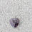 Thumbnail: Heart-shaped amethyst pendant with a silver tree design set against a grey background.