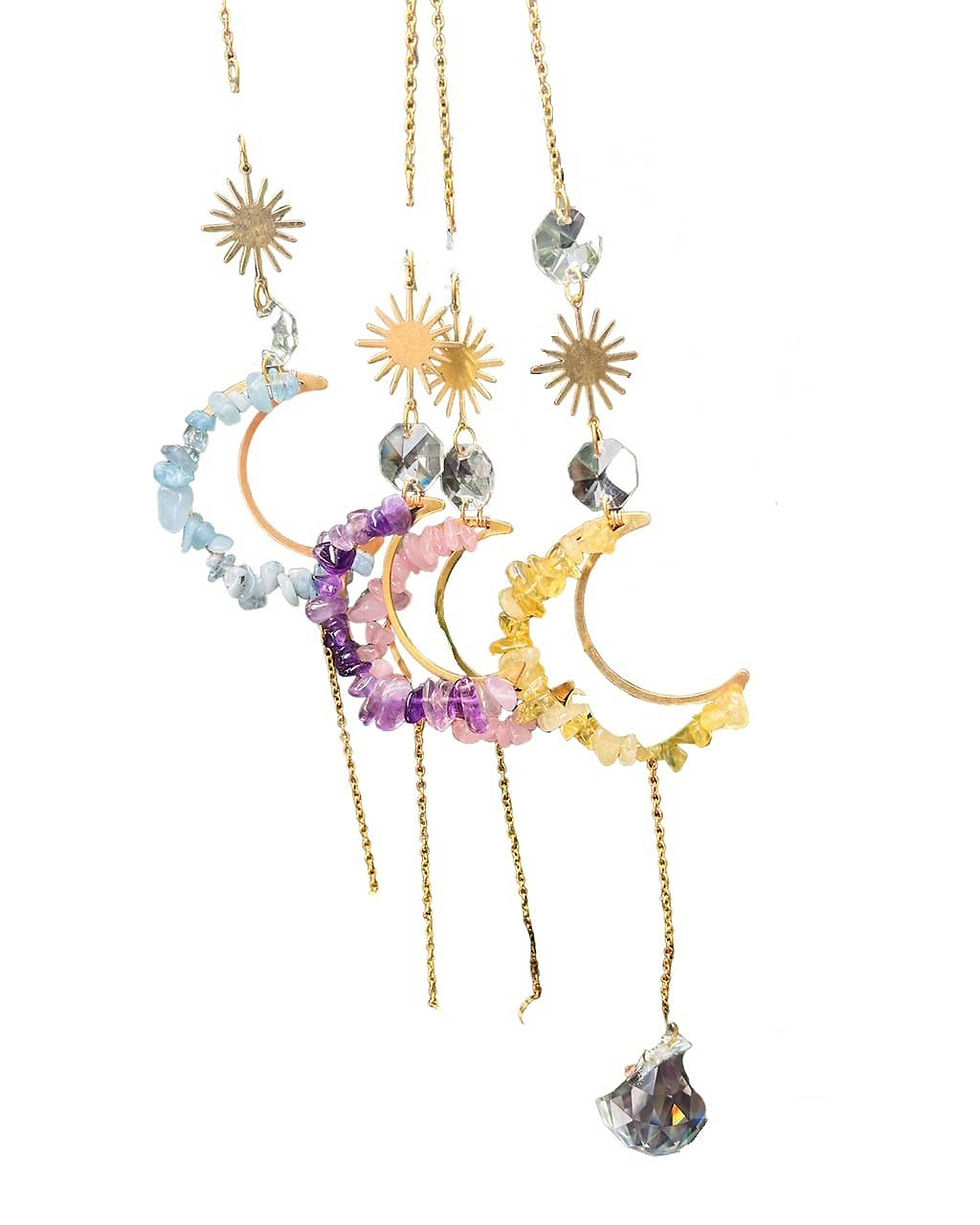 Thumbnail: Gold moon and sun earrings with crystals and gemstones on white background